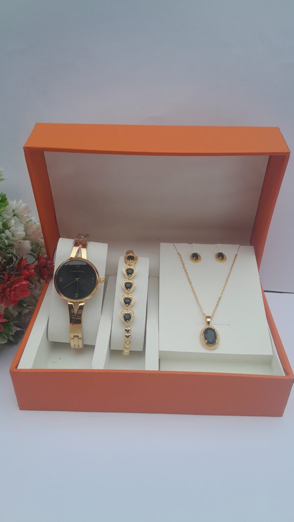 gold and black ladies jewelry set