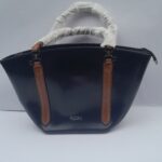Black ladies bag with brown handle