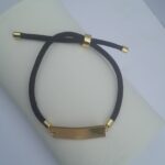 Unisex fashion bracelet black gold metal