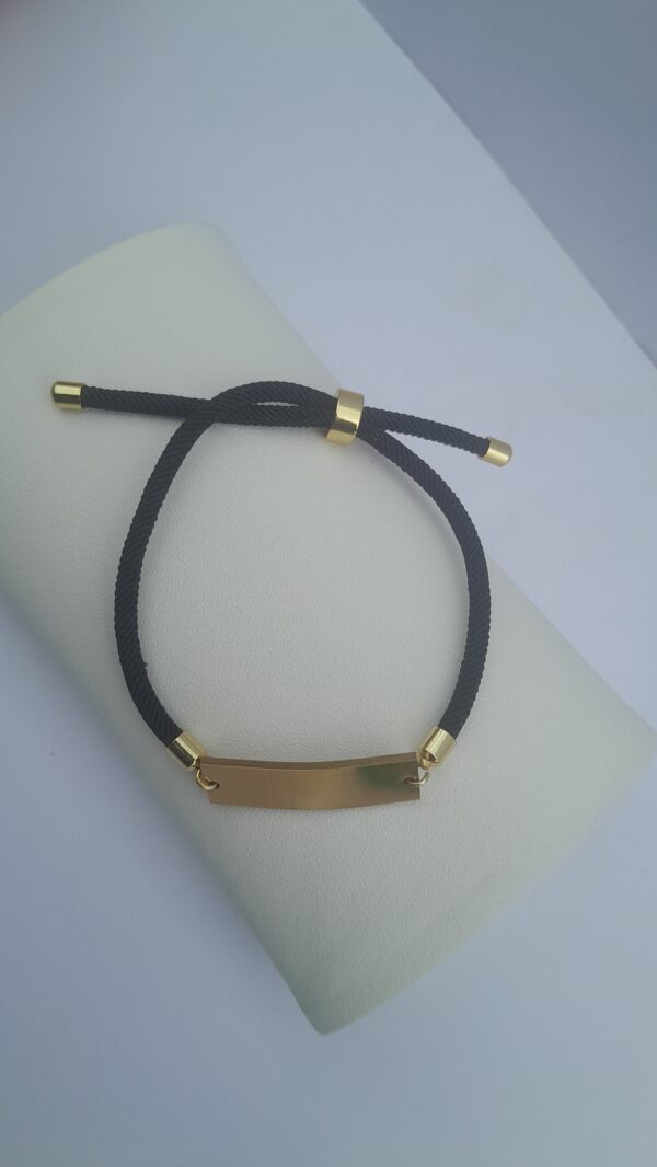 Unisex fashion bracelet black gold metal