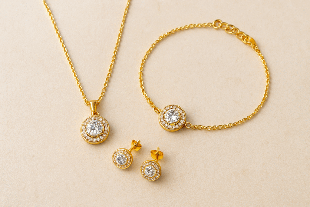 Necklace, bracelet, and earrings displayed together with soft lighting to highlight sparkle.